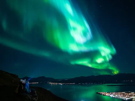 Gazing at the northern lights above Tromsø