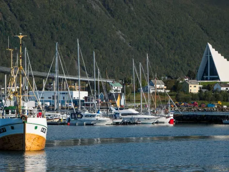 view of Tromsø bridge, boats and the Arctic Cathedral