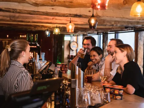 people relaxing in a night bar