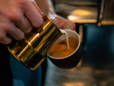 barista preparing coffee in Tromso