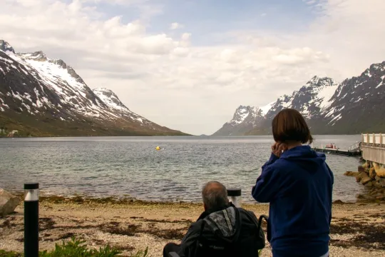 Two guests enjoying the view over Ersfjord