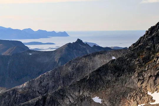 View over mountain tops out towards the sea
