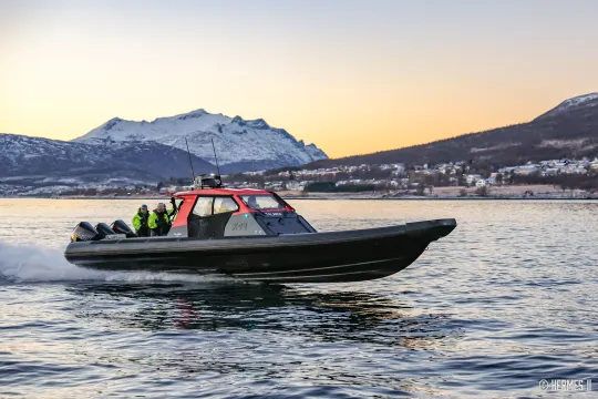 RIB boat in sunset