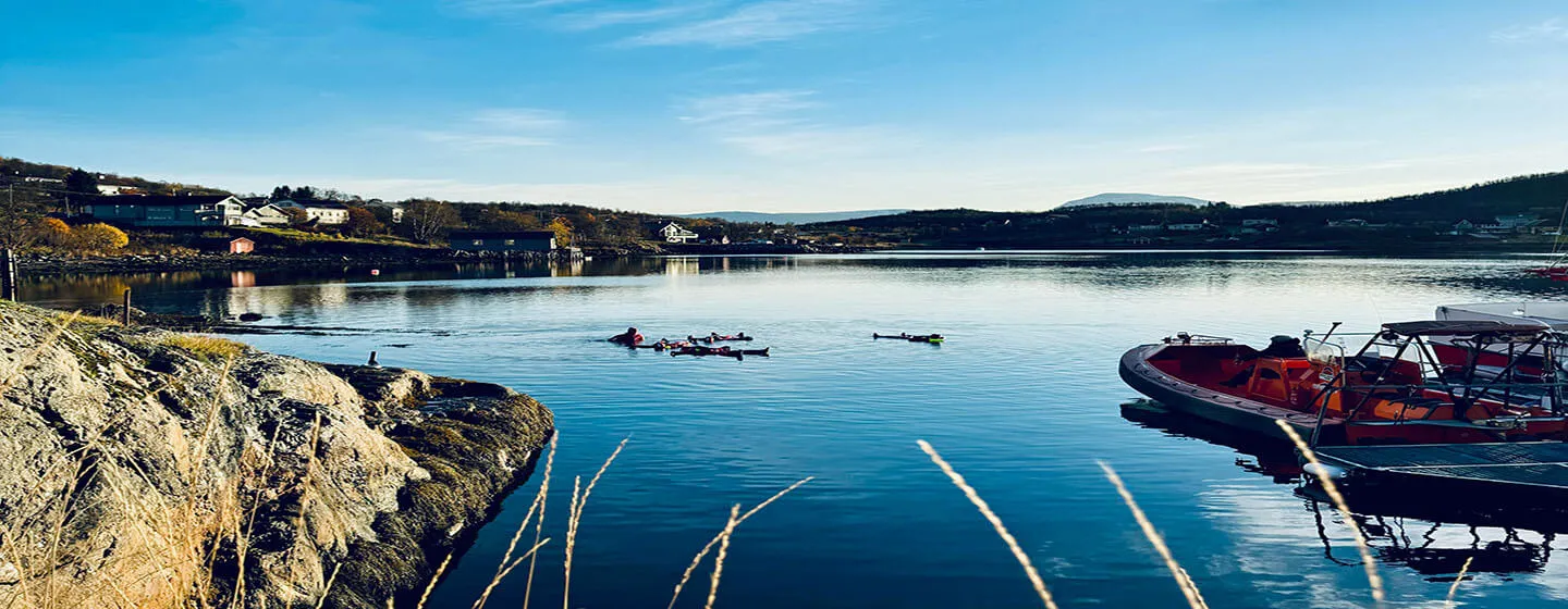 People floating in the arctic water