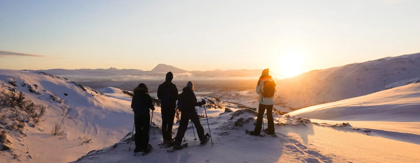 People snowshoeing in Tromso 