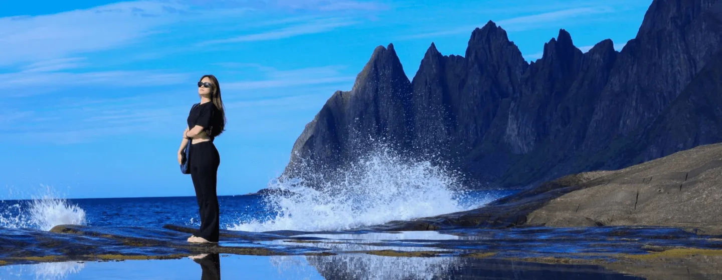 Guest looks out to sea from the Senja island