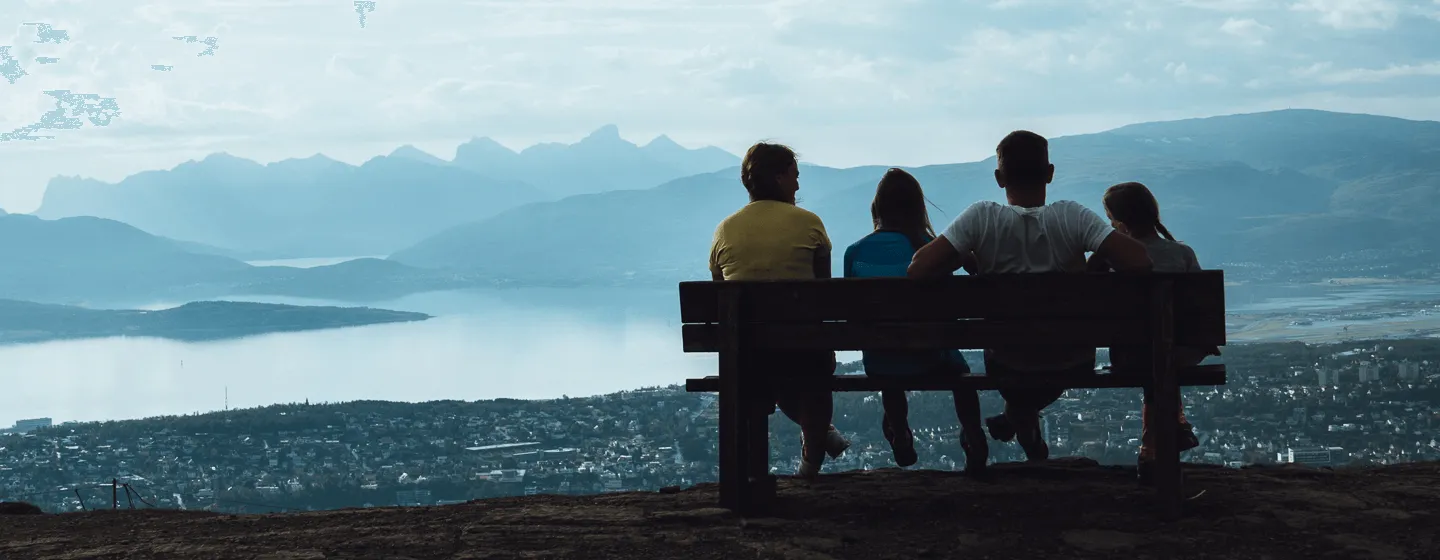 Family enjoying the view of Tromsø and Kvaløya