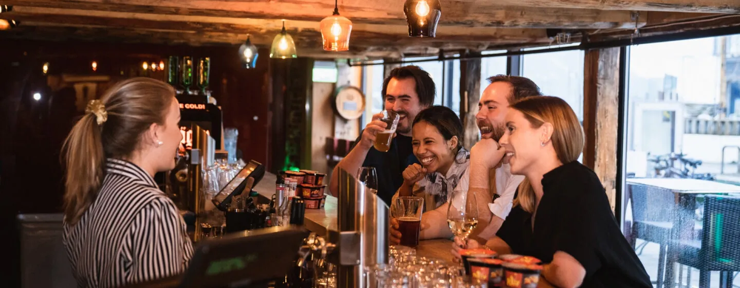 people relaxing in a night bar