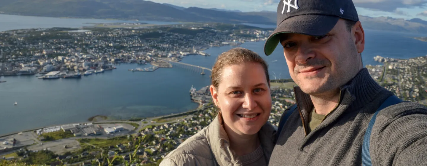 Image of Sarah and Justin with Tromsø in the background