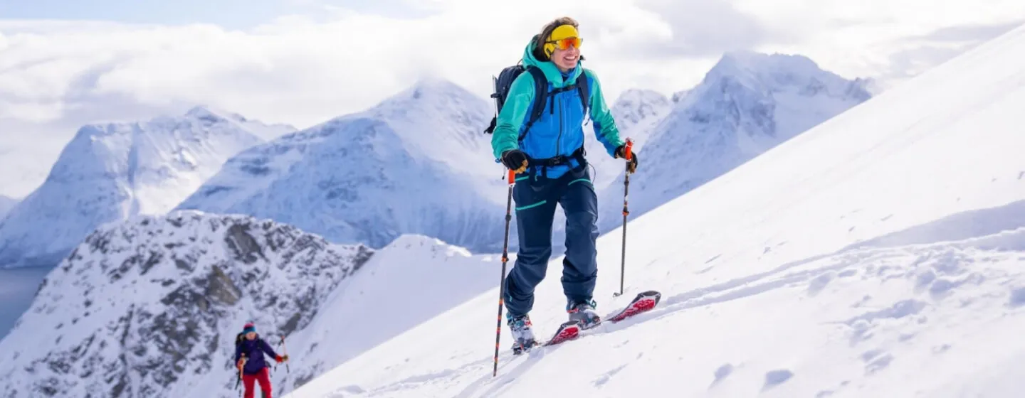 people go skiing in the mountains in Tromsø Ski Guides