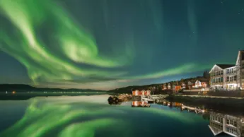 Northern lights dancing over Malangen Resort