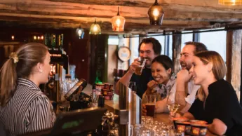 people relaxing in a night bar